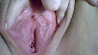 My petite babe finger fucks her pink pussy until it gets creamy