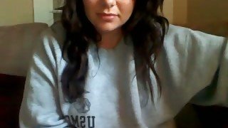 Pretty brunette masturbating on the couch during our webcam chat