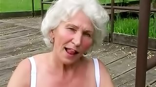 Horny Granny Rubs Her Cunt Outdoor Before Blowjob