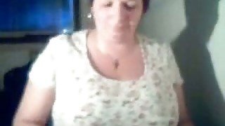 Boobalicious granny playing with her goodies in amateur video