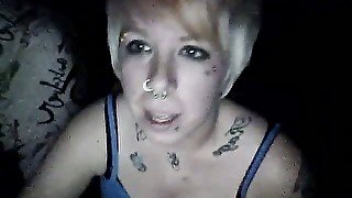 Short haired blonde skank in the dark room on webcam