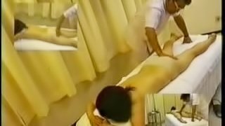 Busty brunette gets all parts of her body massaged