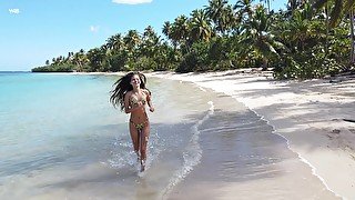 Slender Colombian babe in sexy bikini Irene Rouse running on the beach