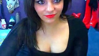 Webcam solo with a chubby brunette flashing her natural tits