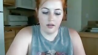 Plump redhead show of her perky tits