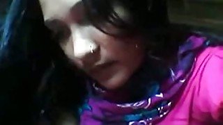 Lewd Pakistani brunette stretches her dark pussy lips on cam