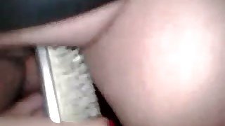 Disgusting chubby harlot pokes her muff with hairbrush