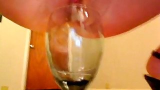 Lusty booty bitch Audrey pounds her anus with sex toy and squirts in glass