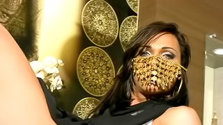 Masked ladyboy performing an outstanding striptease
