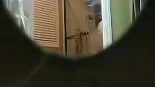 Voyeur hidden camera video of a black hair woman