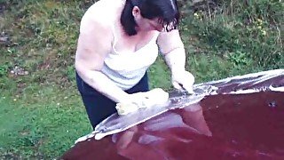 Fat sister of my neighbor washes her car flashing one of her boobs