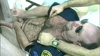 Horny Gay Bear Cop Sucking Some Big Criminal Cocks