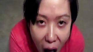 Slanty Eyed Asian Drinking Stranger's Cum