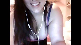 Dark haired buxom cam girl in thongs was flashing her awesome curves