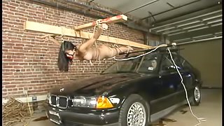 Mika Tan gets lies on a car hood and gets punished