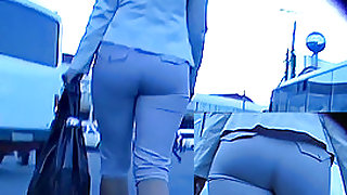 Booty in taut grey breeches