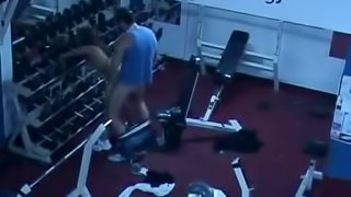 A sexy brunette pleases her insatiable boyfriend in the gym