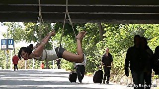 Hot suspended from a bridge in public