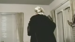 Retro video with blonde MILF fingering her wet pussy