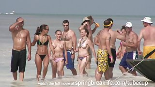 SpringBreakLife Video: Topless Twins In The Water