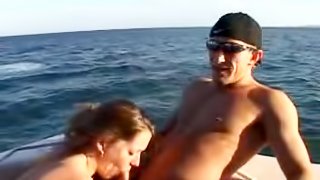 Staci gets her pussy and mouth pounded by two men on a yacht