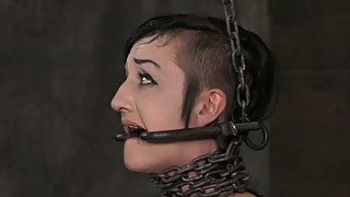 Master fucks her throat with big sex toy in the torture room