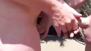 Naked mature lady on the beach wanted to touch our dicks