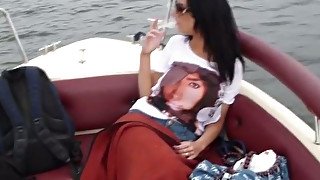 Amateur brunette smokes on a yacht and gives a nice blowjob