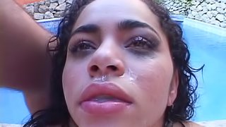 Wavy haired pornstar gets a creampie facial after being gang banged