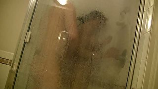 Buxom cutie lets BF joins her in the shower to get twat teased