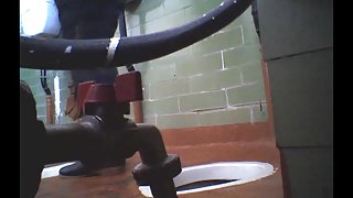 Amateur females in public toilet spread on the voyeur cam