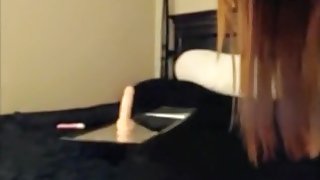 Masturbating then riding her fake cock