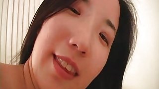 Skinny Asian girl masturbates solo