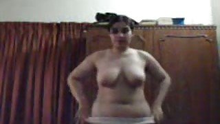 Fatty Indian teen playing with her huge boobies in a bathroom