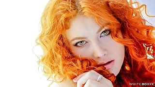 Angelic redhead model Heidi Romanova is stimulating her little crack