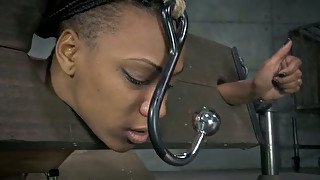 Black chick gets her anal hole punished with sex toy