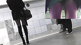 Upskirt in public with slender babe in sexy boots