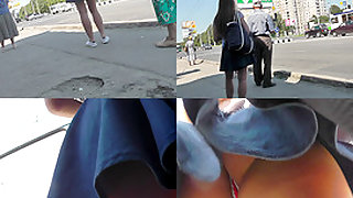 G-string wearing brunette filmed in upskirt video clip