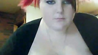 Ardent red haired BBW toys her bald vagina in front of webcam