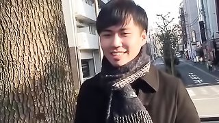 Beautiful young man wearing a grey scarf has no experience in gay porn and wants to be a model