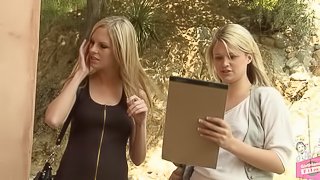 Gentle kissing seduces a pretty blonde girl into lesbian sex