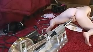 Blonde Teen Playing with a Fucking Machine