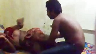 Cute Indian housewife cuddles in bed with a man from neighborhood