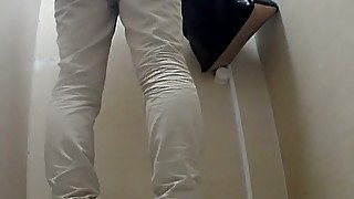 White chick in the public restroom cleans her pussy on hidden cam