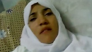 Arab amateur lady in white hijab shows her big natural tits