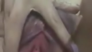 Horny Chinese girl rubbing pussy