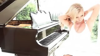 Blonde doll gets horny after plying the piano and starts wanking off on the floor
