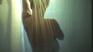 Hidden cam video of my lustful blonde wife taking a shower