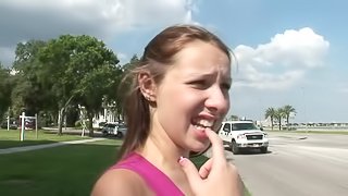Zoe Rae shows her natural tits and shaved pussy in the street