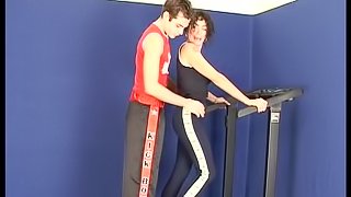 Hot cougar with a hairy pussy enjoying a hardcore fuck in the gym